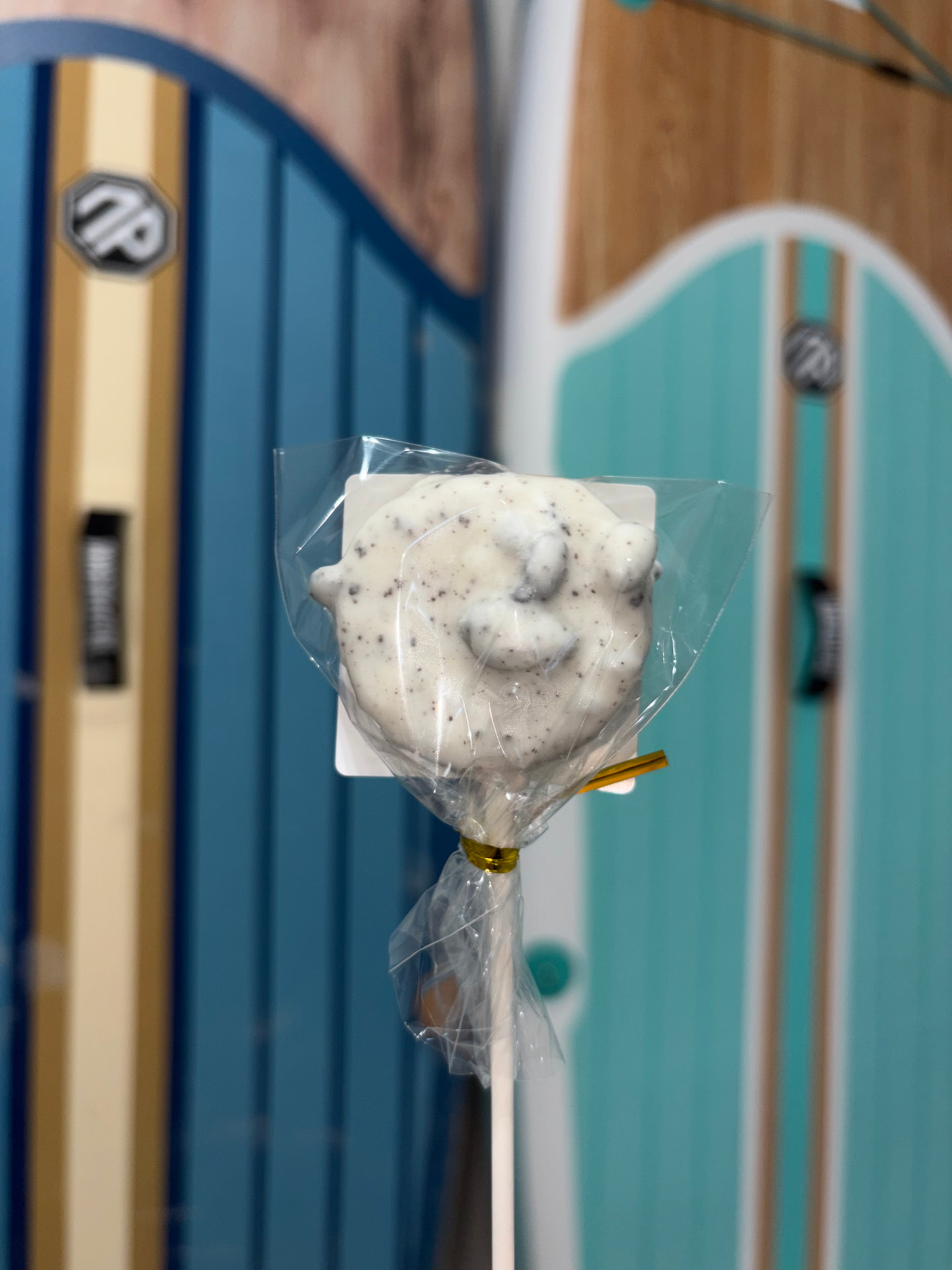 Cookies and cream cake pop dipped in white chocolate